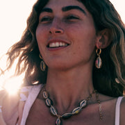 Hand painted hand made cowrie shell earrings. Holiday Earrings australia resort